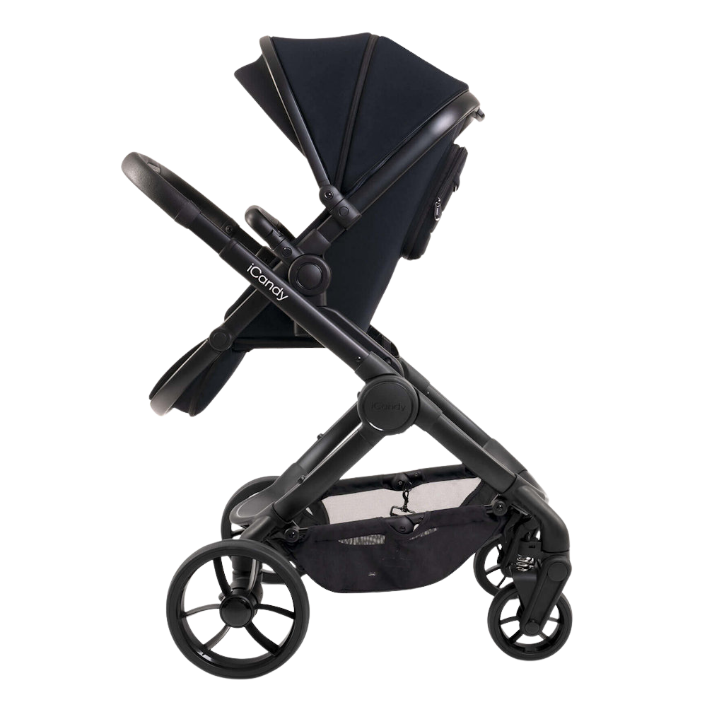 iCandy Peach 7 Stroller Black Edition in rear facing mode and on elevators to bring the baby close.